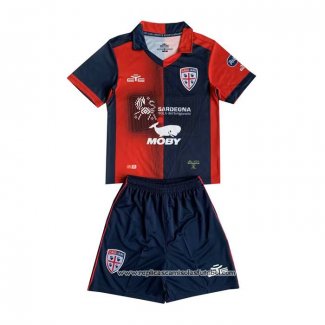 Camisola 1º Cagliari Calcio 2023-2024 Crianca